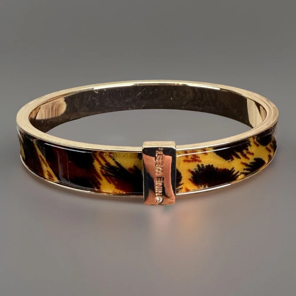 Beautiful, goldtone, animal print nine west bangle bracelet